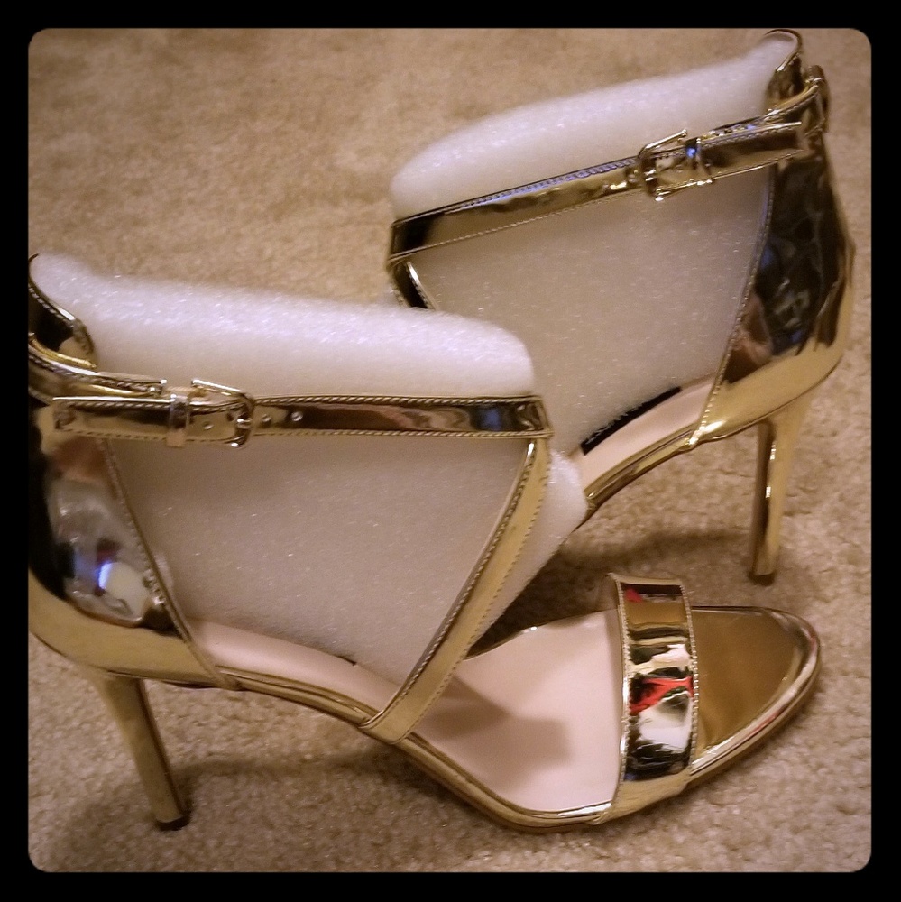 Gold strappy heels